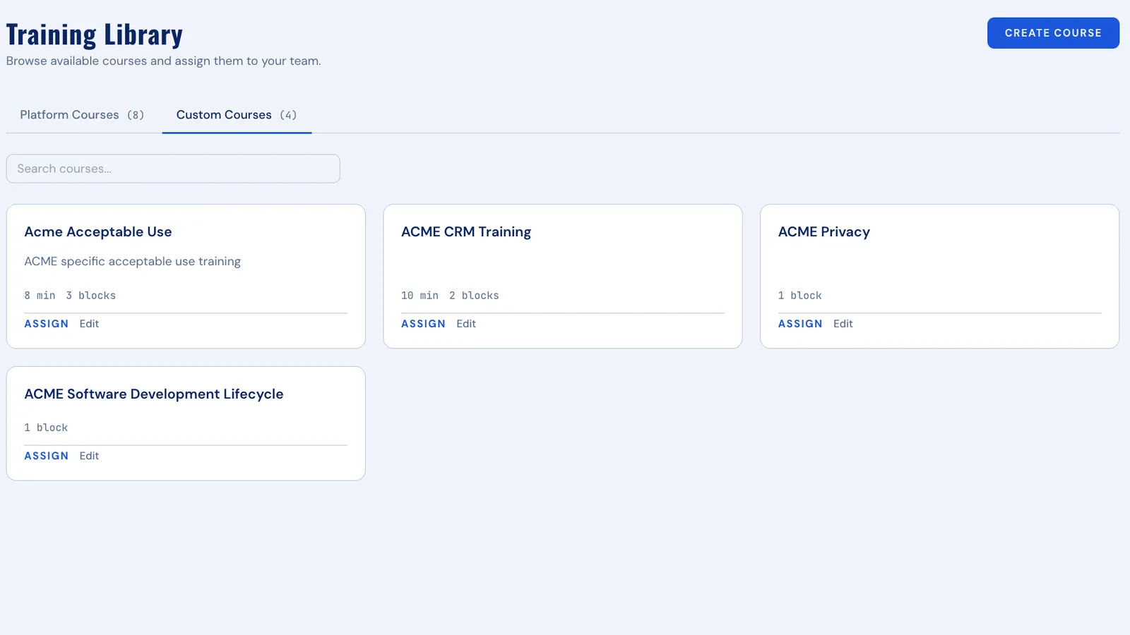 The training library's custom courses tab: four organisation-built modules sitting alongside the platform catalogue, each ready to assign or edit — published custom training living in the same library as Zoib-built modules.